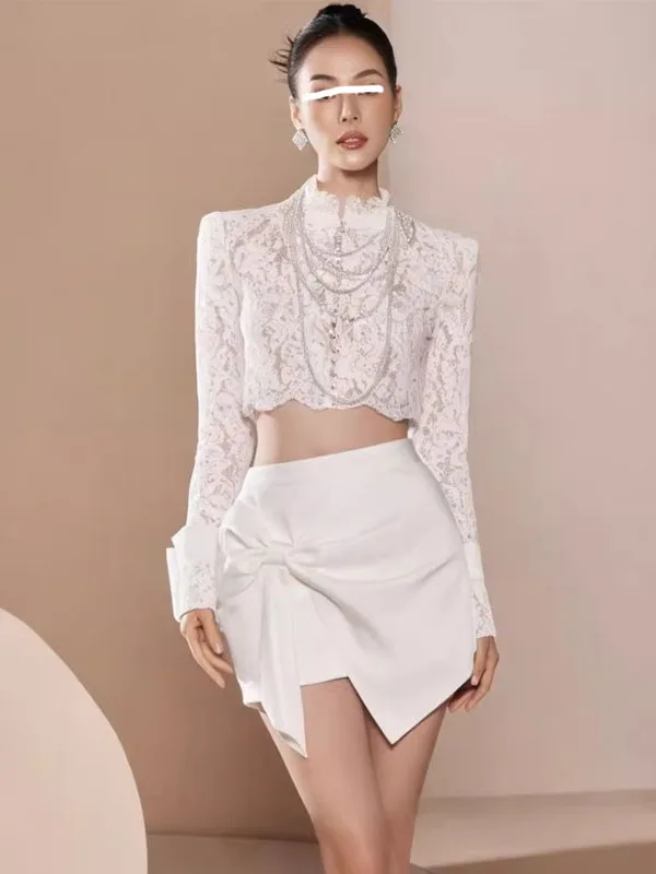 Elegant Lace Stand Collar Long Sleeve Top with Knot High Waist Asymmetrical Skirt Fashionable Two-Piece Set for Women
Elegant Lace Stand Collar Long Sleeve Top with Knot High Waist Asymmetrical Skirt Fashionable Two-Piece Set for Women