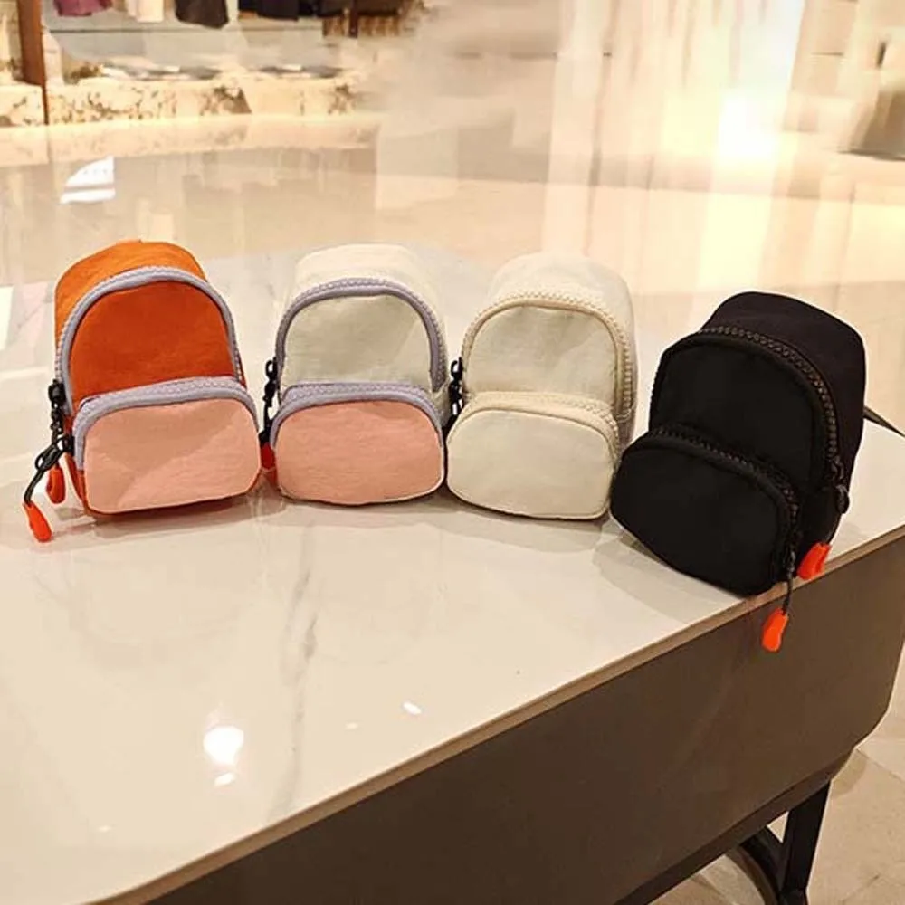 Square Hanging Neck Coin Purse Backpack Shaped Casual Oxford Cloth Mini Wallet Zipper Bag with Lanyard Small Pendant Key Pouch
Square Hanging Neck Coin Purse Backpack Shaped Casual Oxford Cloth Mini Wallet Zipper Bag with Lanyard Small Pendant Key Pouch