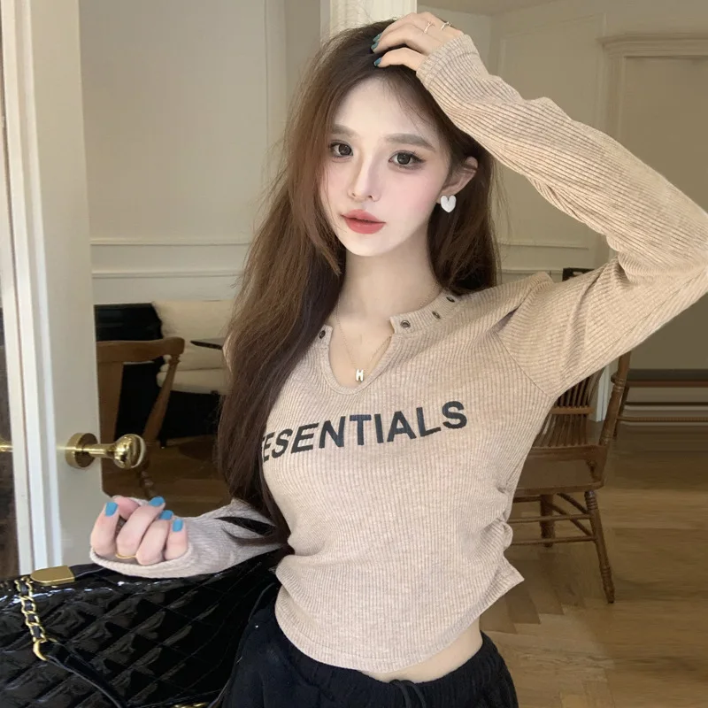 Letter pleated waist cinching long sleeved T-shirt for women in spring and autumn, solid color, slim fit short style
Letter pleated waist cinching long sleeved T-shirt for women in spring and autumn, solid color, slim fit short style