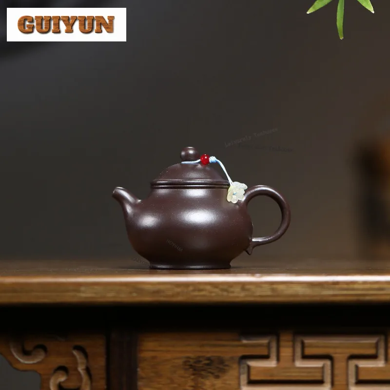 140ml Ancient Yixing Purple Clay Teapots Handmade Pan Pot Raw Ore Purple Jade Gold Sand Mud Tea Soaking Kettle Zisha Tea Set Cha
140ml Ancient Yixing Purple Clay Teapots Handmade Pan Pot Raw Ore Purple Jade Gold Sand Mud Tea Soaking Kettle Zisha Tea Set Cha