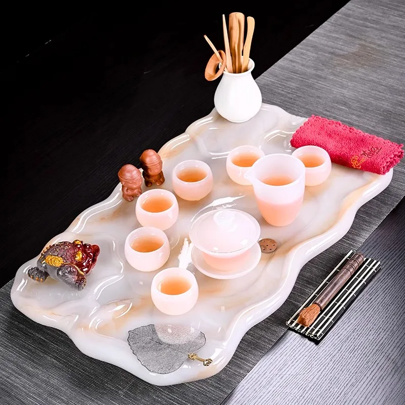 Household tea tray set European-style whole stone tea sea simple creative jade single-layer living room rock slab tea table
Household tea tray set European-style whole stone tea sea simple creative jade single-layer living room rock slab tea table