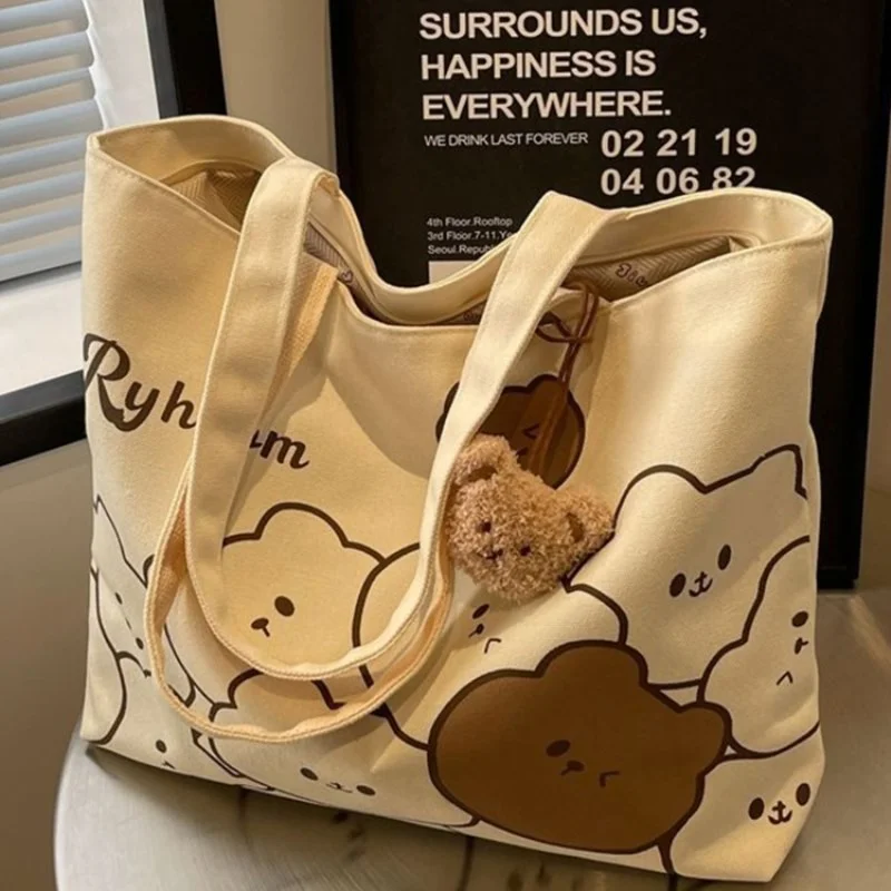 Casual Large Capacity Canvas Bag Single Shoulder Commuter Bag for Women Summer New Cartoon Bear Design Business Scene
Casual Large Capacity Canvas Bag Single Shoulder Commuter Bag for Women Summer New Cartoon Bear Design Business Scene