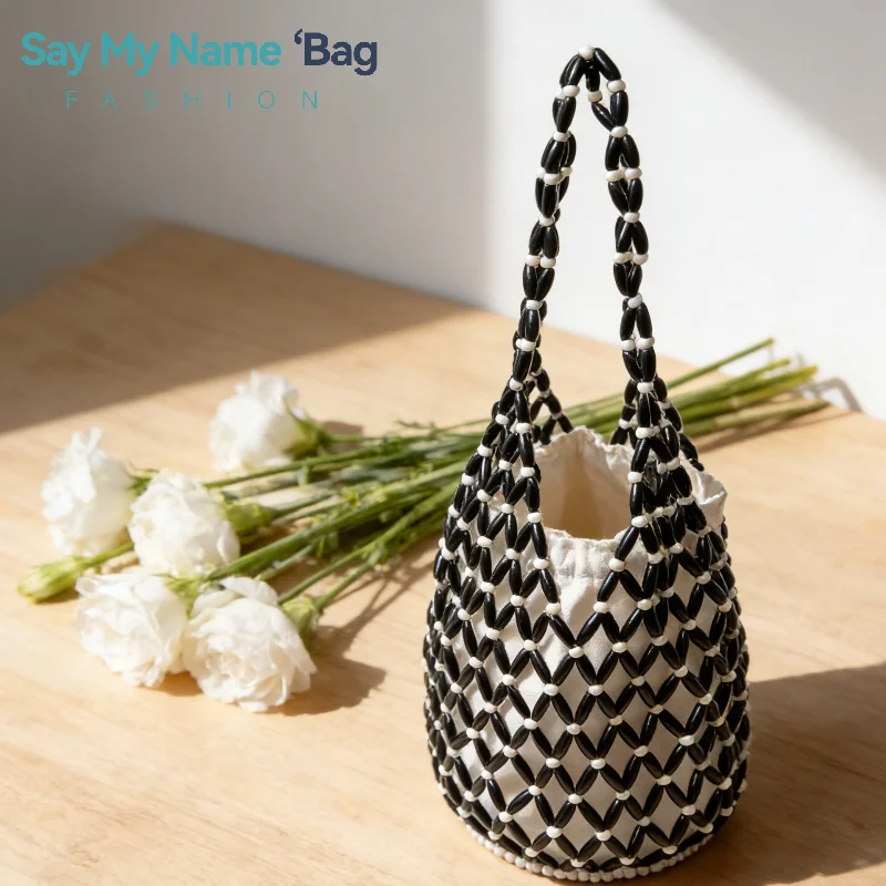 Hollow Woven Women's Handbag Wooden Bead Bag Bucket Shoulder Bag Beach Crossbody Bag Handmade Exquisite Fashionable And Simple
Hollow Woven Women's Handbag Wooden Bead Bag Bucket Shoulder Bag Beach Crossbody Bag Handmade Exquisite Fashionable And Simple