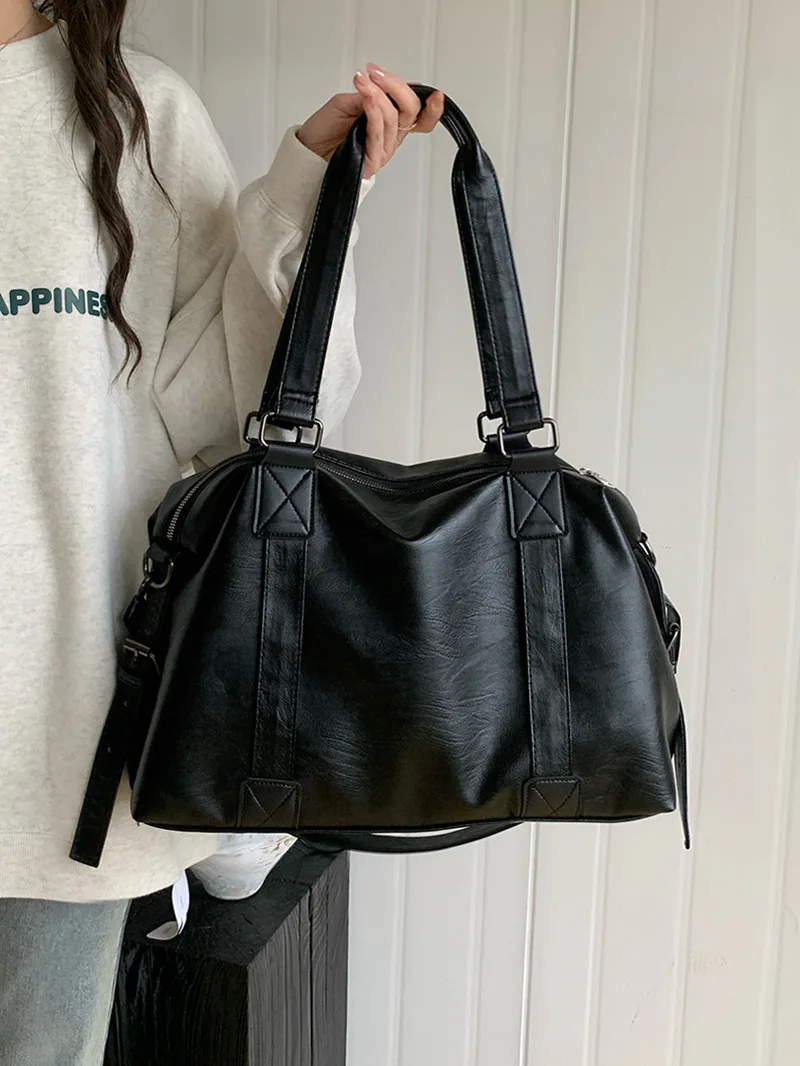 Handheld travel bag for women 2025 new Korean version casual tote bag, large capacity crossbody bag, luggage bag
Handheld travel bag for women 2025 new Korean version casual tote bag, large capacity crossbody bag, luggage bag