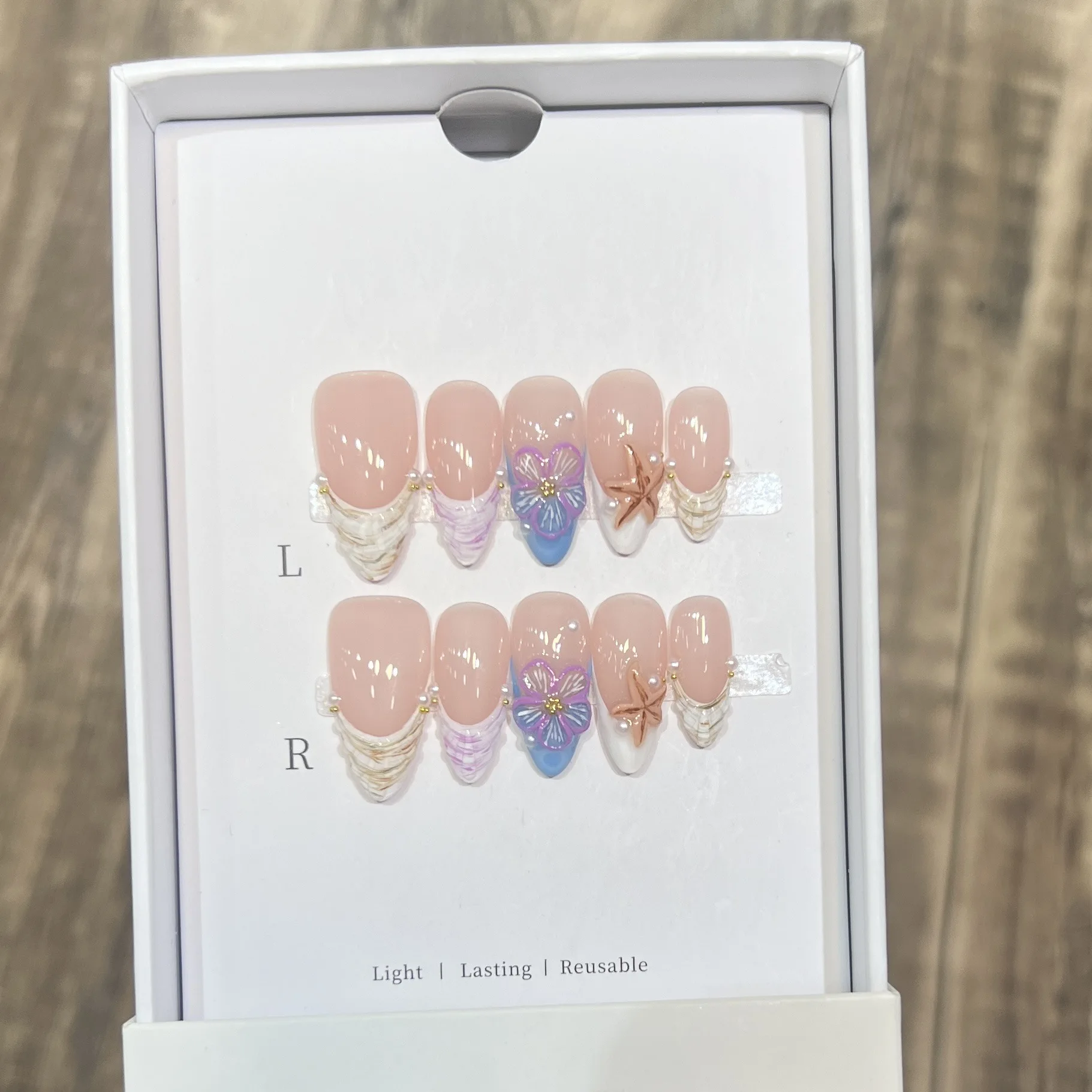 10pcs White French Almond Handmade Press on Nails 3D Flower Starfish Fake Nails Pearl Wearable Artificial Full Cover False Nails
10pcs White French Almond Handmade Press on Nails 3D Flower Starfish Fake Nails Pearl Wearable Artificial Full Cover False Nails