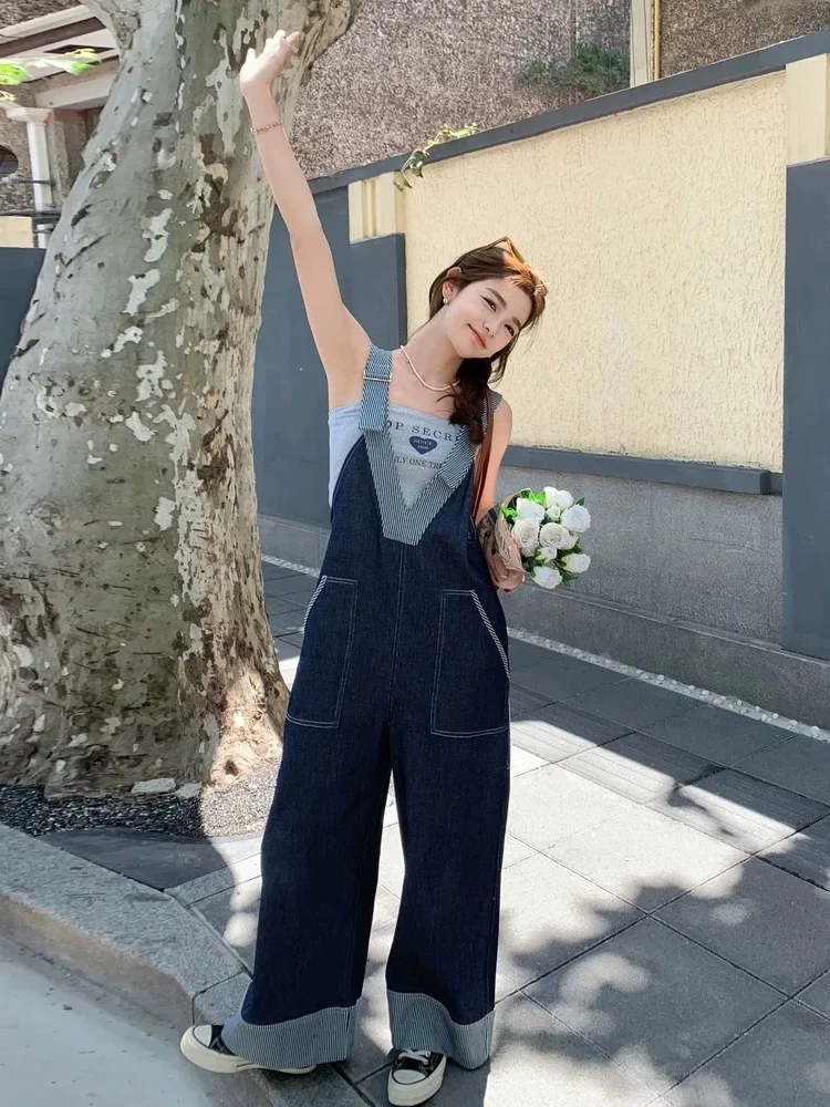 Korean Women's Blue Denim Patchwork V Neck Sleeveless Jumpsuit Spring Summer Wide Leg Trousers Romper Loose Jean Long Pant Trend
Korean Women's Blue Denim Patchwork V Neck Sleeveless Jumpsuit Spring Summer Wide Leg Trousers Romper Loose Jean Long Pant Trend