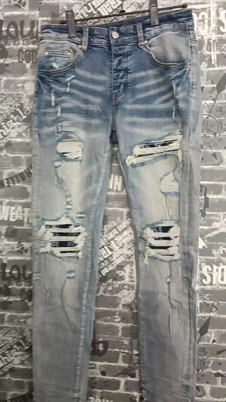 American designer's new fashionable men's jeans, color blocked black patch elastic slim fit retro light blue tapered jeans
American designer's new fashionable men's jeans, color blocked black patch elastic slim fit retro light blue tapered jeans