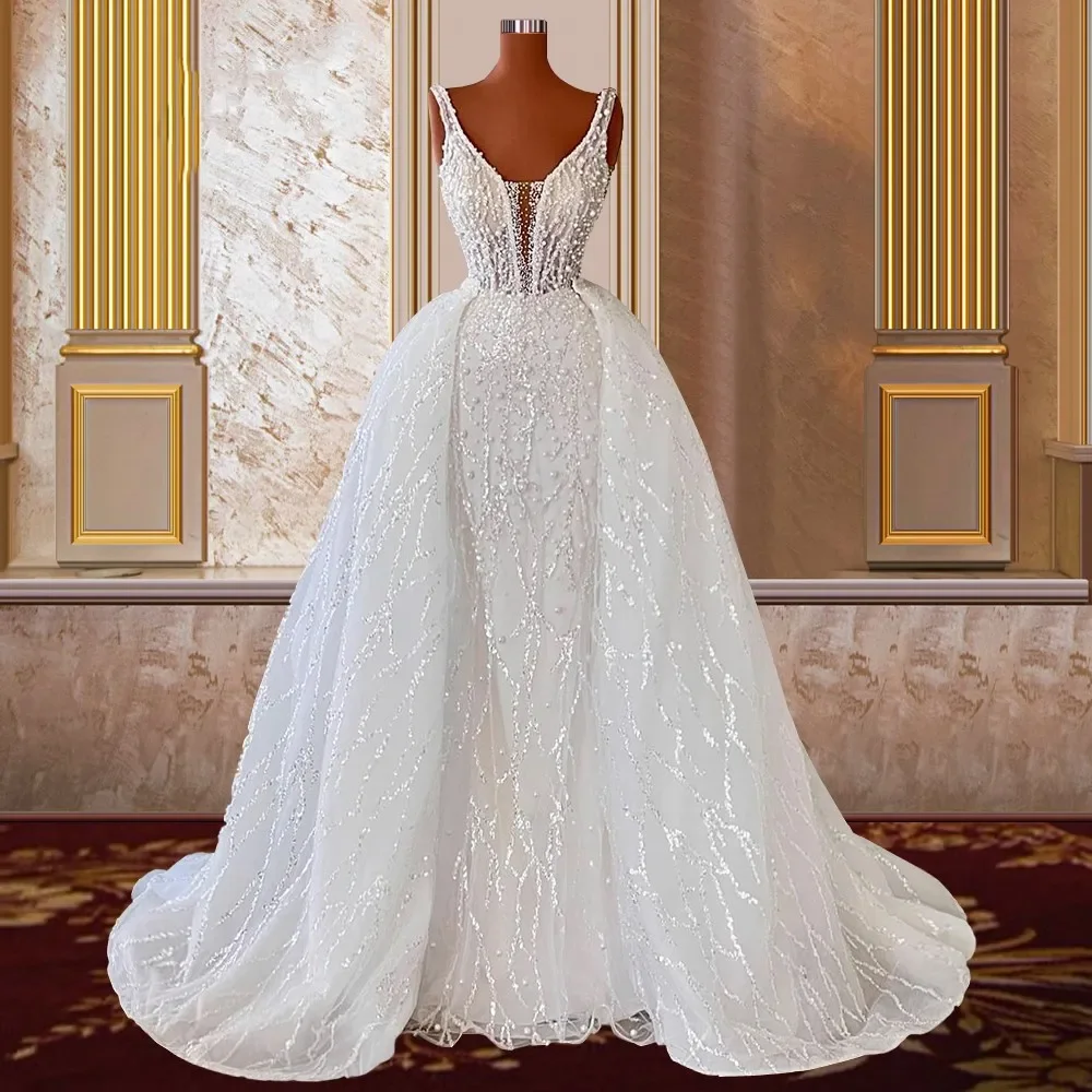Full Pearls Mermaid Wedding Dress with Detachable Skirt Deep V Neck Lace Beaded Sleeveless Bridal Gowns
Full Pearls Mermaid Wedding Dress with Detachable Skirt Deep V Neck Lace Beaded Sleeveless Bridal Gowns