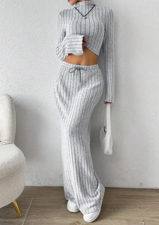 Spring New Elegant and Personalized Women's 2-Piece Set with Semi High Collar and Flared Sleeves Knitted Straight Tube Skirt Set
Spring New Elegant and Personalized Women's 2-Piece Set with Semi High Collar and Flared Sleeves Knitted Straight Tube Skirt Set