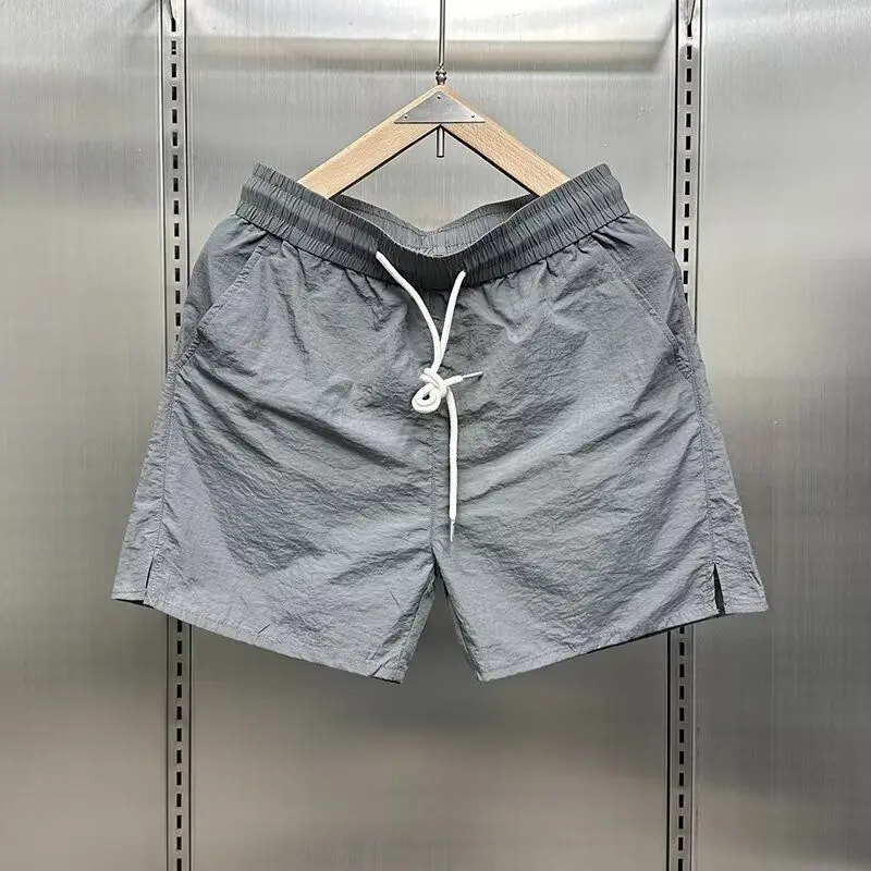 Trendy Men's Short Pants Summer Thin Cool Feeling Ice Silk Elastic Waist Drawstring Loose Casual Five-Quarter Pants
Trendy Men's Short Pants Summer Thin Cool Feeling Ice Silk Elastic Waist Drawstring Loose Casual Five-Quarter Pants