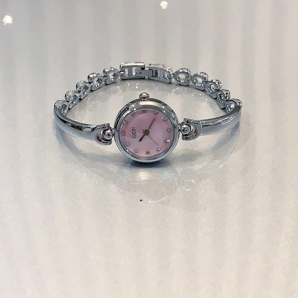 NEW Minimalist Fashion Bracelet Watches for Women Small Round Dial Clock Gift Women's Quartz Watch in Silver
NEW Minimalist Fashion Bracelet Watches for Women Small Round Dial Clock Gift Women's Quartz Watch in Silver