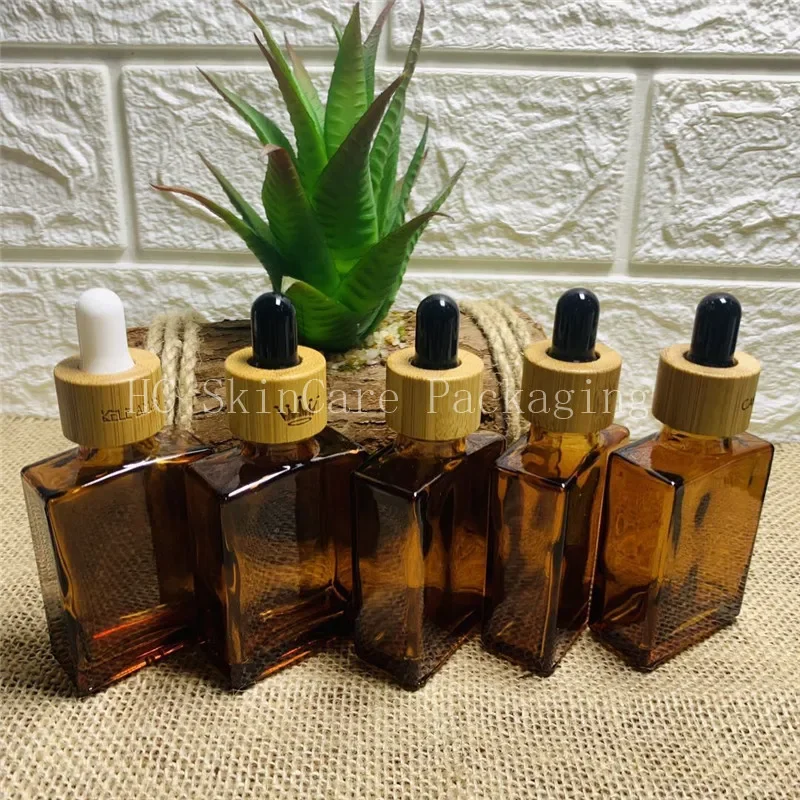 cosmetic containers square amber cosmetic bottle with dropper and bamboo cap rectangle essential oil bottle GlassDropper Bottle
cosmetic containers square amber cosmetic bottle with dropper and bamboo cap rectangle essential oil bottle GlassDropper Bottle