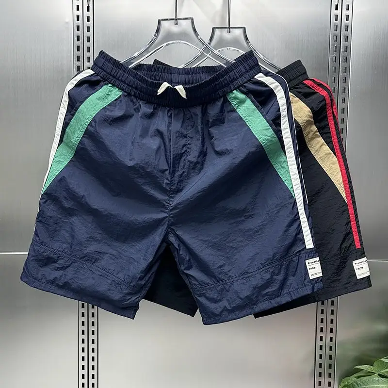 Chaopai Motion Summer Men's Elastic Waist Drawstring Contrast Color Patchwork Quick Drying Fashion Casual Loose Wide Leg Shorts
Chaopai Motion Summer Men's Elastic Waist Drawstring Contrast Color Patchwork Quick Drying Fashion Casual Loose Wide Leg Shorts
