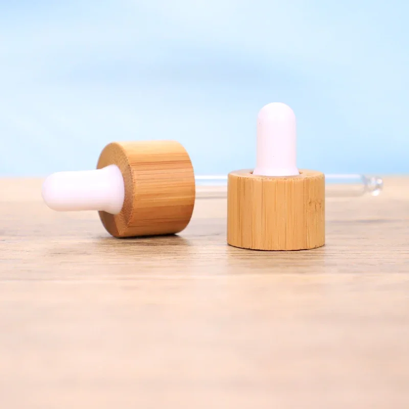 hot selling Neck Diameter Eco-Friendly Bamboo Essential Oil Bottle Top Bulb Glass Pipette Dropper Lid Cap for hair oil Bottles
hot selling Neck Diameter Eco-Friendly Bamboo Essential Oil Bottle Top Bulb Glass Pipette Dropper Lid Cap for hair oil Bottles