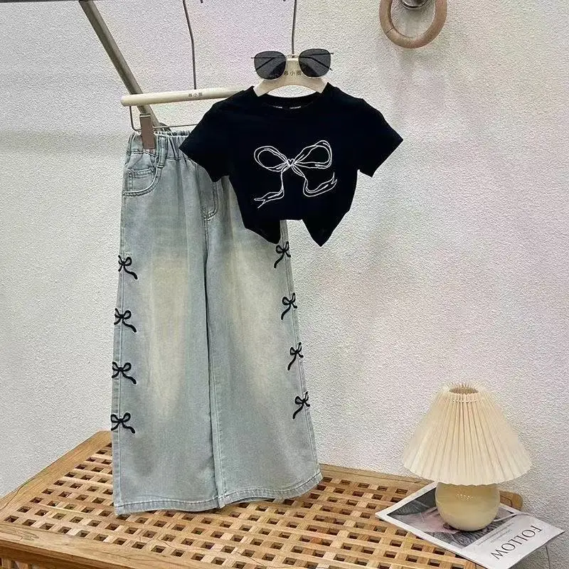 Girls Summer Thin Set Teenage Girls Round Neck T-shirt Wide Leg Jeans 2-piece Children's Clothing Set
Girls Summer Thin Set Teenage Girls Round Neck T-shirt Wide Leg Jeans 2-piece Children's Clothing Set