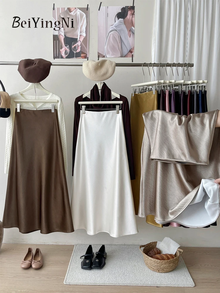 Beiyingni осенне-зимние флисовые юбки трапециевидной формы, женские толстые повседневные тонкие атласные юбки с высокой талией, женская элегантная французская винтажная юбка
Beiyingni осенне-зимние флисовые юбки трапециевидной формы, женские толстые повседневные тонкие атласные юбки с высокой талией, женская элегантная французская винтажная юбка