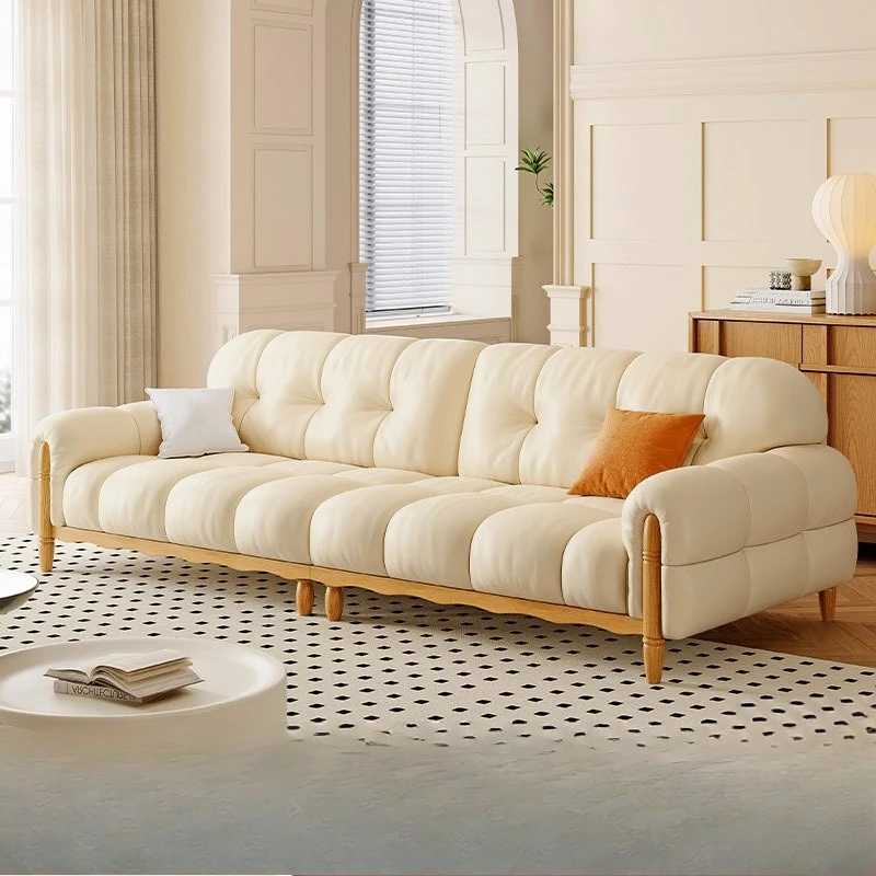 PYJ cream log puff sofa cloud marshmallow straight row solid wood leather sofa
PYJ cream log puff sofa cloud marshmallow straight row solid wood leather sofa