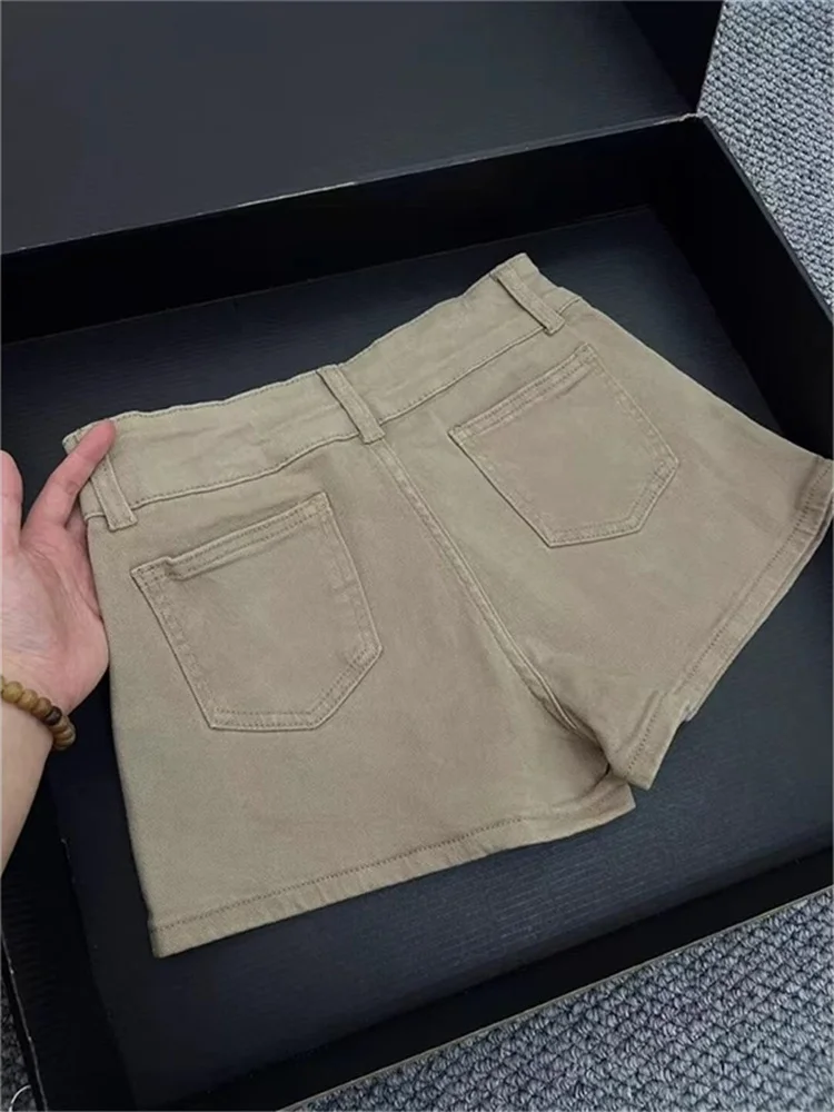 Эластичные джинсовые брюки цвета хаки больших размеров, женские осенние брюки с высокой талией для похудения в стиле ретро, американские прямые шорты трапециевидной формы
Эластичные джинсовые брюки цвета хаки больших размеров, женские осенние брюки с высокой талией для похудения в стиле ретро, американские прямые шорты трапециевидной формы