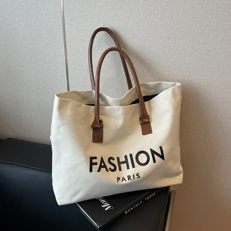 Canvas Class Commuter Alphabet Bag Large Capacity Shoulder Tote Bag Casual Shopping Bag
Canvas Class Commuter Alphabet Bag Large Capacity Shoulder Tote Bag Casual Shopping Bag