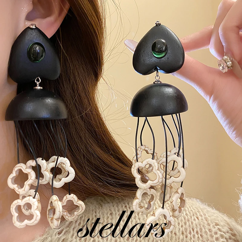 Unique Design Silver Needle Round Tassel Earrings Wood Stone Material Niche High-End Temperament Ear Accessories
Unique Design Silver Needle Round Tassel Earrings Wood Stone Material Niche High-End Temperament Ear Accessories