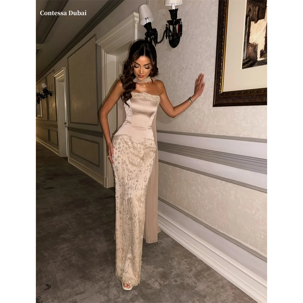 Contessa Dubai Champagne Vintage Bead Embroidery Prom Dress Strapless Neck Ribbonفساتين سهراتSheath Sweep Train Srobes de soirée
Contessa Dubai Champagne Vintage Bead Embroidery Prom Dress Strapless Neck Ribbonفساتين سهراتSheath Sweep Train Srobes de soirée