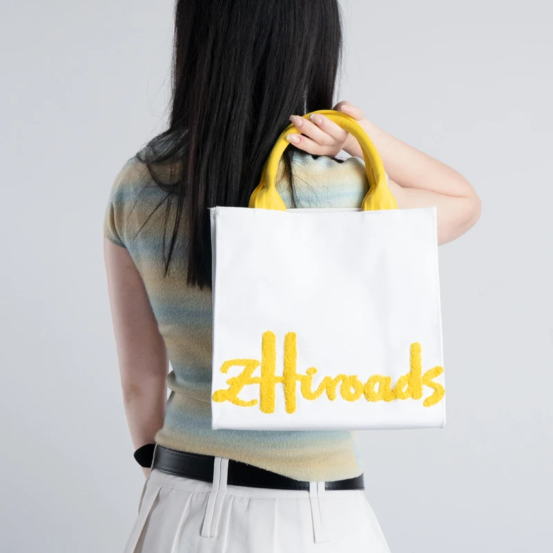 Модная желтая хлопковая сумка-тоут для женщин с вышитым логотипом, женский модный аксессуар, хлопковая сумка-тоут
Модная желтая хлопковая сумка-тоут для женщин с вышитым логотипом, женский модный аксессуар, хлопковая сумка-тоут