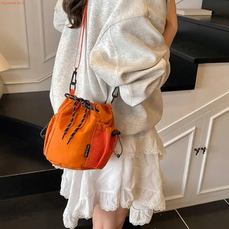 2025 Summer Bucket Bag Lightweight Nylon Handbag For Women Casual Crossbody Shoulder Bag With Spacious Interior
2025 Summer Bucket Bag Lightweight Nylon Handbag For Women Casual Crossbody Shoulder Bag With Spacious Interior