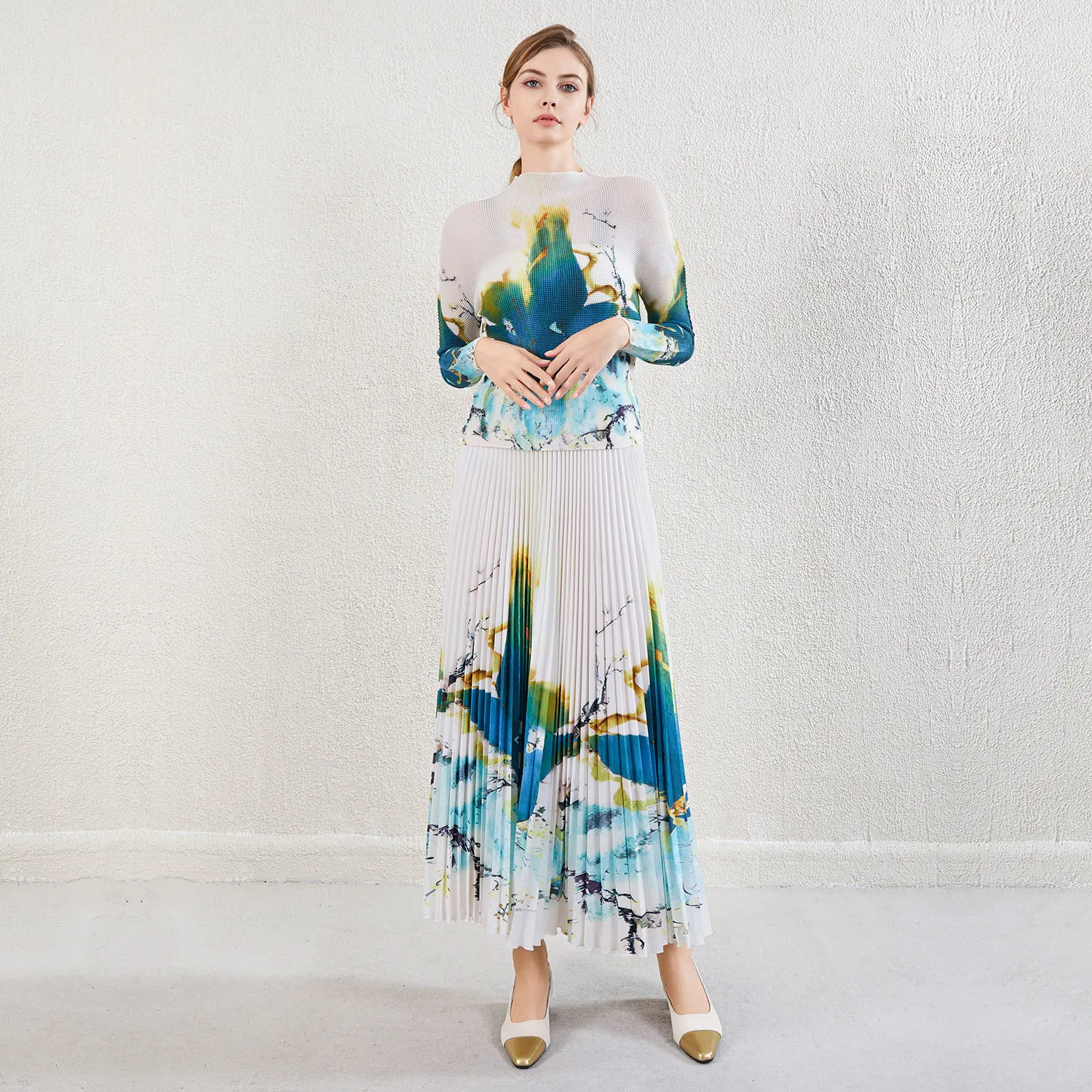 Wholesale Miyake Pleated Design Set European and American Casual Printed Pleated Top and Long Pleated Skirt 2-piece Set
Wholesale Miyake Pleated Design Set European and American Casual Printed Pleated Top and Long Pleated Skirt 2-piece Set