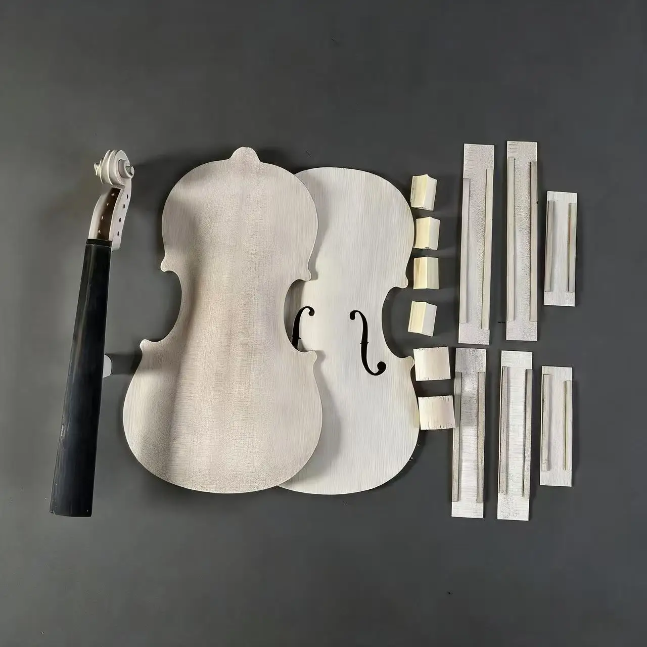 Unfinished violin set, including spruce top, maple back, maple sides, maple head, spruce hornwood, in various sizes
Unfinished violin set, including spruce top, maple back, maple sides, maple head, spruce hornwood, in various sizes