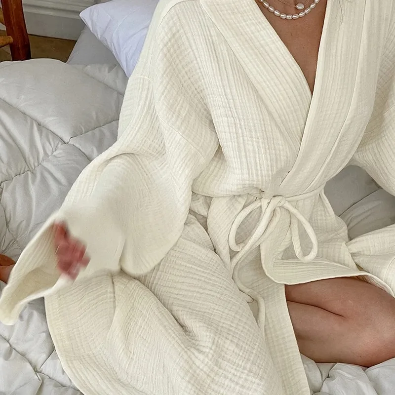 Women's Solid Beige Nightrobe Long-Sleeve V-Neck Front Belt Robe Soft And Breathable Fabric Ideal For Bathrobe Cozy Sleepwear
Women's Solid Beige Nightrobe Long-Sleeve V-Neck Front Belt Robe Soft And Breathable Fabric Ideal For Bathrobe Cozy Sleepwear