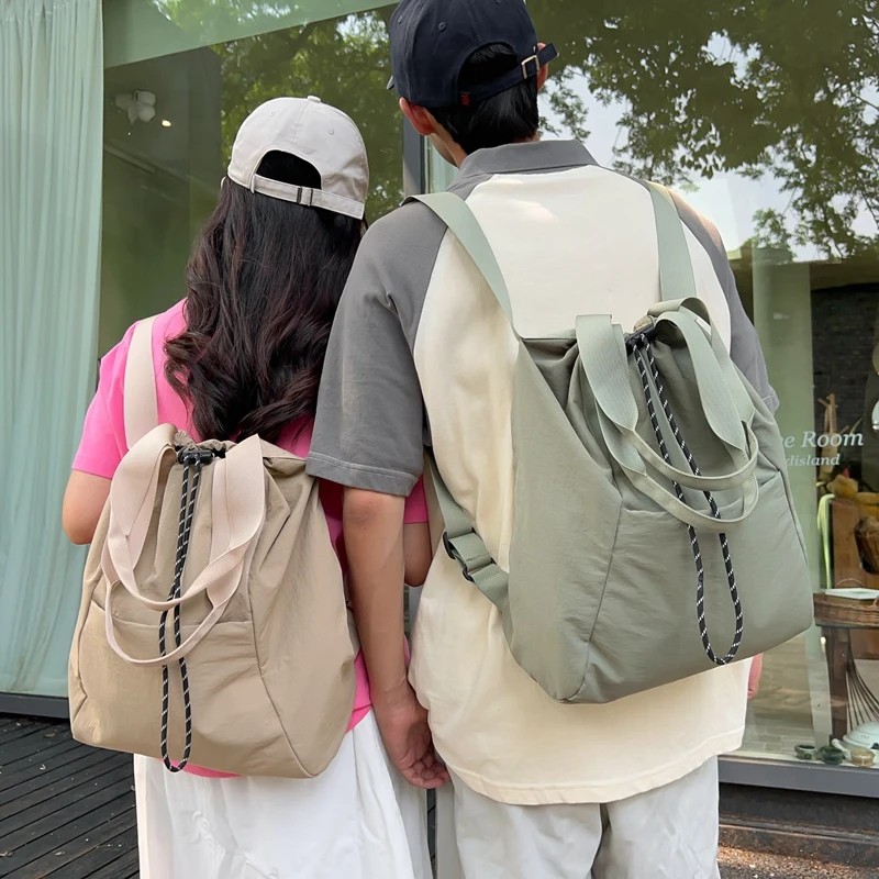Couple Nylon Drawstring Backpacks Lightweight Summer Fashion Adjustable Straps Unisex Design Large Capacity
Couple Nylon Drawstring Backpacks Lightweight Summer Fashion Adjustable Straps Unisex Design Large Capacity