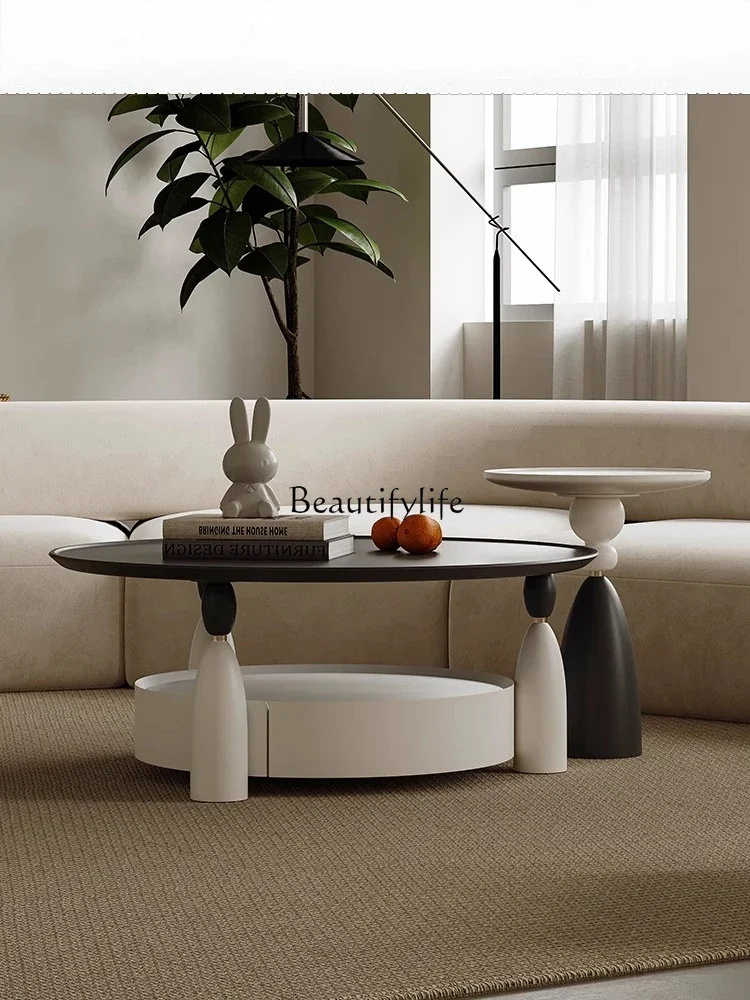 jj *Cream wind coffee table simple modern small apartment light luxury round combination
jj *Cream wind coffee table simple modern small apartment light luxury round combination