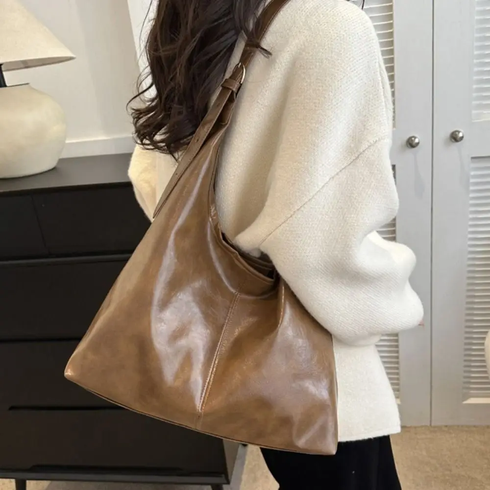 Элегантная сумка-тоут из мягкой кожи, большая вместительная однотонная дорожная сумка на плечо, легкая винтажная сумка на молнии для женщин
Элегантная сумка-тоут из мягкой кожи, большая вместительная однотонная дорожная сумка на плечо, легкая винтажная сумка на молнии для женщин