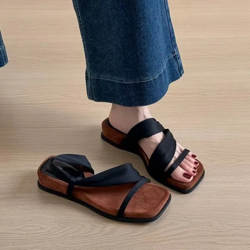 Thick Heel Slippers Summer 2026 Versatile Black Strap Sandals Outdoor Wear Heightening Casual Slope Heel Platform Shoes
Thick Heel Slippers Summer 2026 Versatile Black Strap Sandals Outdoor Wear Heightening Casual Slope Heel Platform Shoes