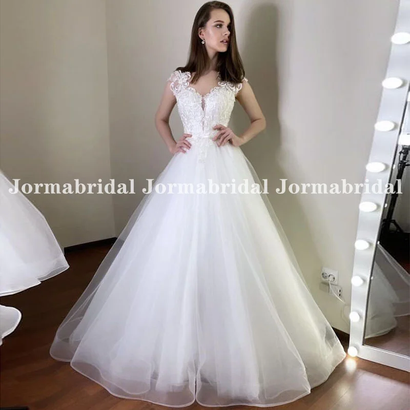 White Lace Tulle Wedding Dresses Cap Sleeve Princess A-Line Floral Appliques Beach Bridal Gowns Floor Length Outdoor Bride Dress
White Lace Tulle Wedding Dresses Cap Sleeve Princess A-Line Floral Appliques Beach Bridal Gowns Floor Length Outdoor Bride Dress