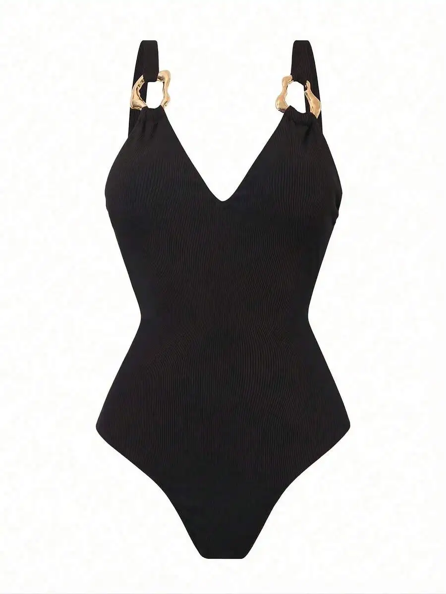 Black Vertical Ribbed One-Piece Swimsuit Featuring Gold Hardware Straps And Integrated Skirt For Resort Wear
Black Vertical Ribbed One-Piece Swimsuit Featuring Gold Hardware Straps And Integrated Skirt For Resort Wear
