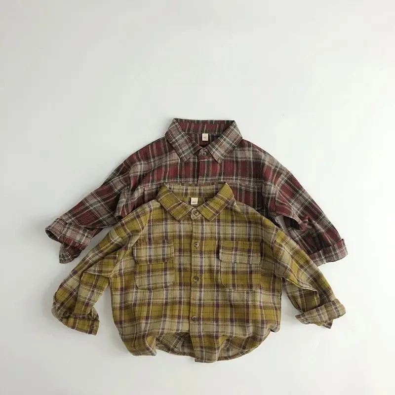 Клетчатая рубашка для мальчиков и девочек, весенне-осеннее хлопковое детское повседневное пальто в западном стиле с длинными рукавами
Клетчатая рубашка для мальчиков и девочек, весенне-осеннее хлопковое детское повседневное пальто в западном стиле с длинными рукавами