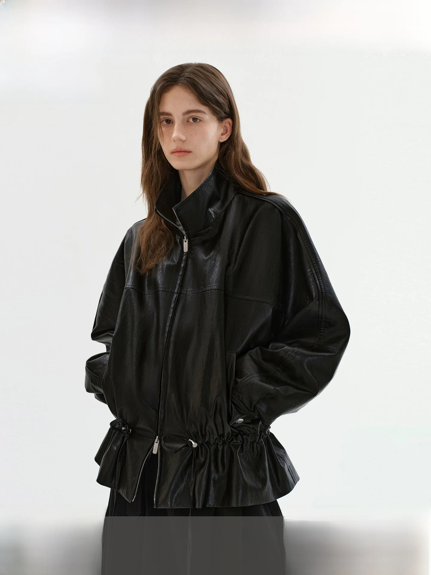 Fano Women's Short Leather Jacket Drawstring Waist Drop Shoulder Stand Collar Double Zipper Black Leather Coat for Youth
Fano Women's Short Leather Jacket Drawstring Waist Drop Shoulder Stand Collar Double Zipper Black Leather Coat for Youth