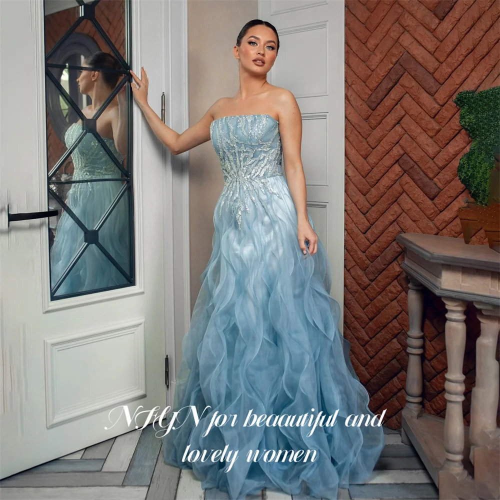 NFYN Blue Tulle Party Dresses Strapless Sleeveless Evening Dress A Line Wave Hem Prom Gown Minimalist فساتين سهره Customized
NFYN Blue Tulle Party Dresses Strapless Sleeveless Evening Dress A Line Wave Hem Prom Gown Minimalist فساتين سهره Customized