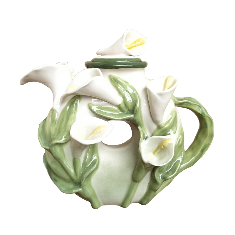 Underglaze ceramic calla lily flower teapot ornament handmade kettle European decoration
Underglaze ceramic calla lily flower teapot ornament handmade kettle European decoration