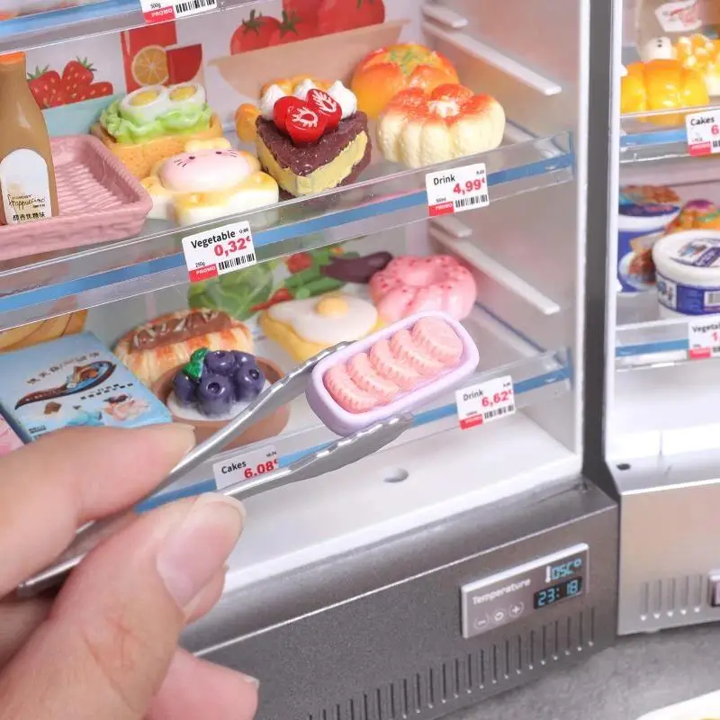 Dollhouse Tiny Refrigerator Miniature Kitchen Furniture Display Model with Food Accessories for Home Desktop Decor
Dollhouse Tiny Refrigerator Miniature Kitchen Furniture Display Model with Food Accessories for Home Desktop Decor