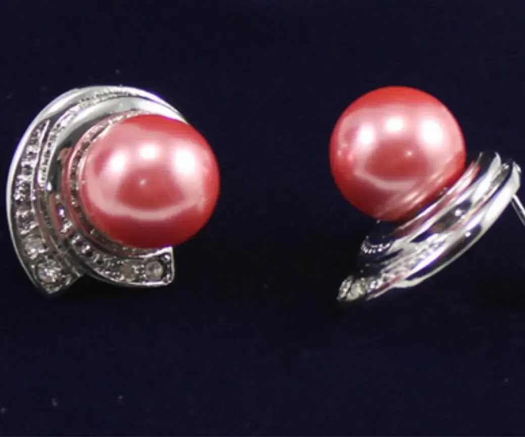 Women's fashion simple silver plated deep pink shell pearl earrings
Women's fashion simple silver plated deep pink shell pearl earrings