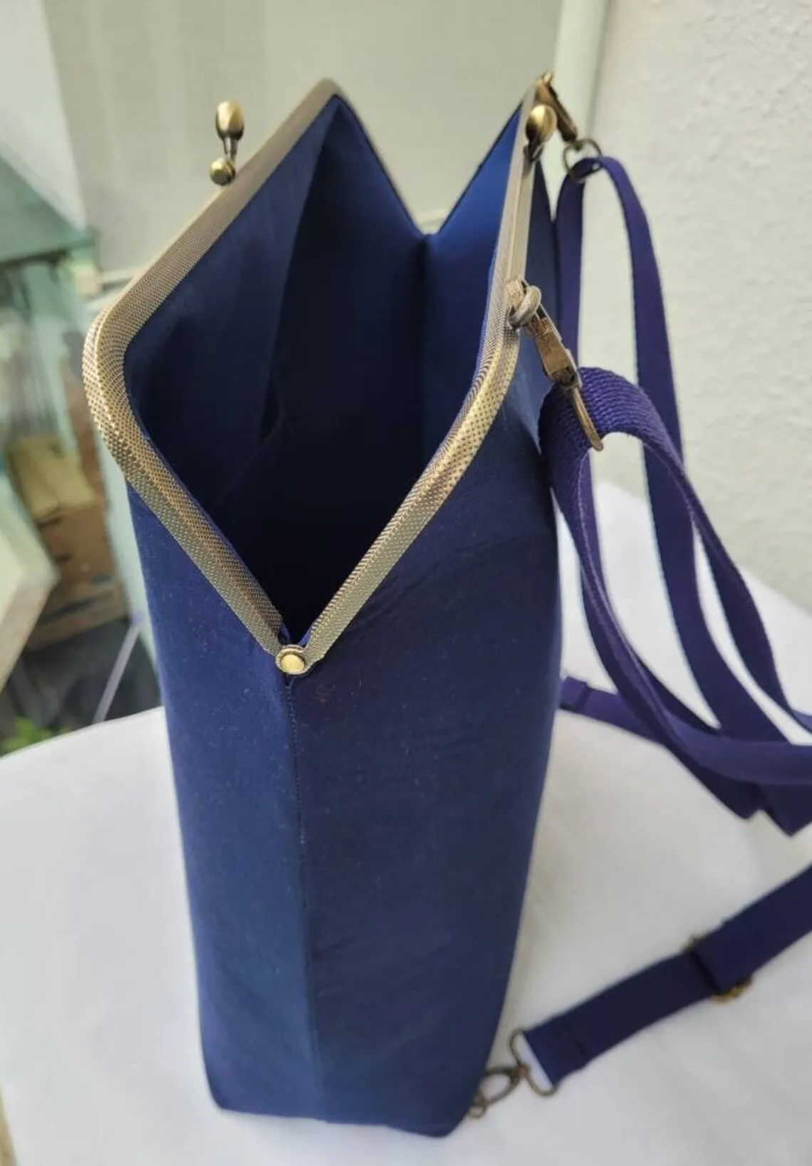 Lost In Vintage Large Size Navy Colour Convertible Backpack with Metal Antique Brass Kiss Lock Opening Shoulder Bag 40x11x37cm
Lost In Vintage Large Size Navy Colour Convertible Backpack with Metal Antique Brass Kiss Lock Opening Shoulder Bag 40x11x37cm