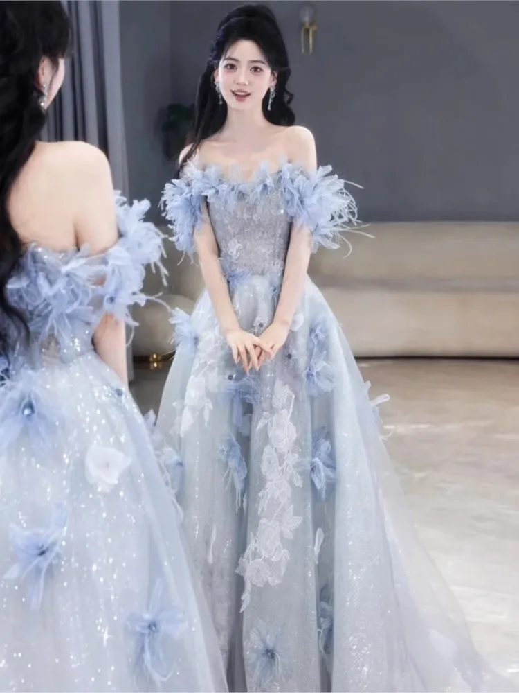A blue one-shoulder birthday party and coming-of-age ceremony host's light luxury niche dress
A blue one-shoulder birthday party and coming-of-age ceremony host's light luxury niche dress