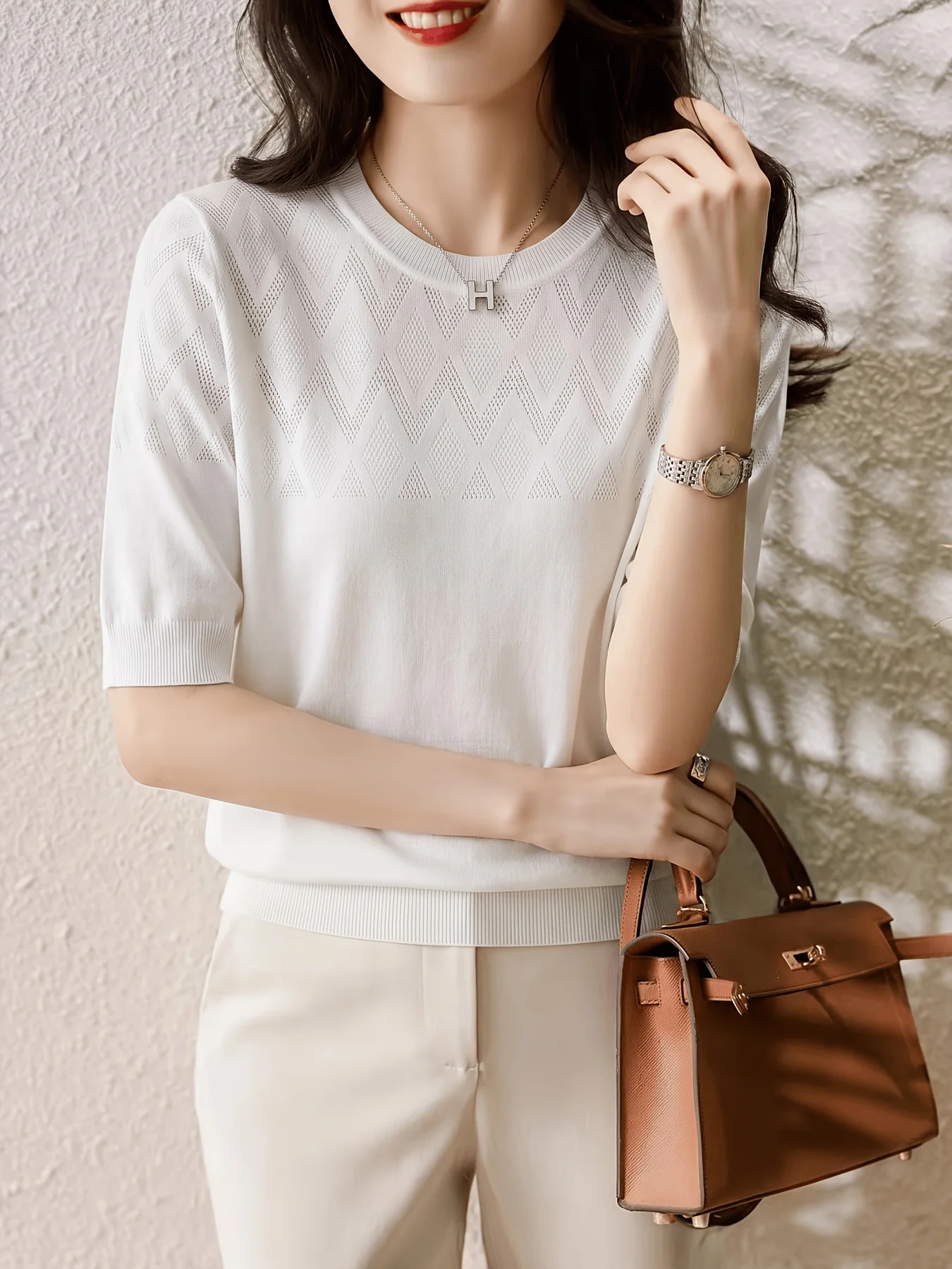 Temperament hollowed out round neck knitted short sleeved women new loose and slimming commuting fashionable base versatile top
Temperament hollowed out round neck knitted short sleeved women new loose and slimming commuting fashionable base versatile top