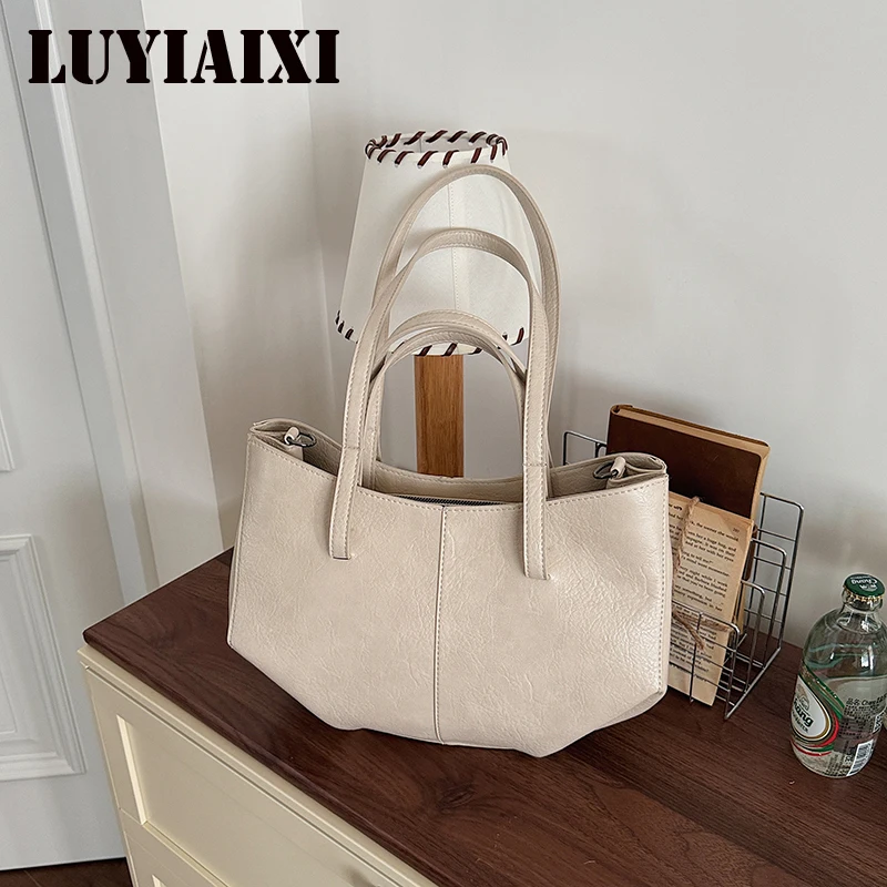 Light Luxury Vintage PU Soft Tote Bag for Women Hot Sale Minimalist Youth Crossbody Bags Large Capacity Casual Shoulder Handbag
Light Luxury Vintage PU Soft Tote Bag for Women Hot Sale Minimalist Youth Crossbody Bags Large Capacity Casual Shoulder Handbag