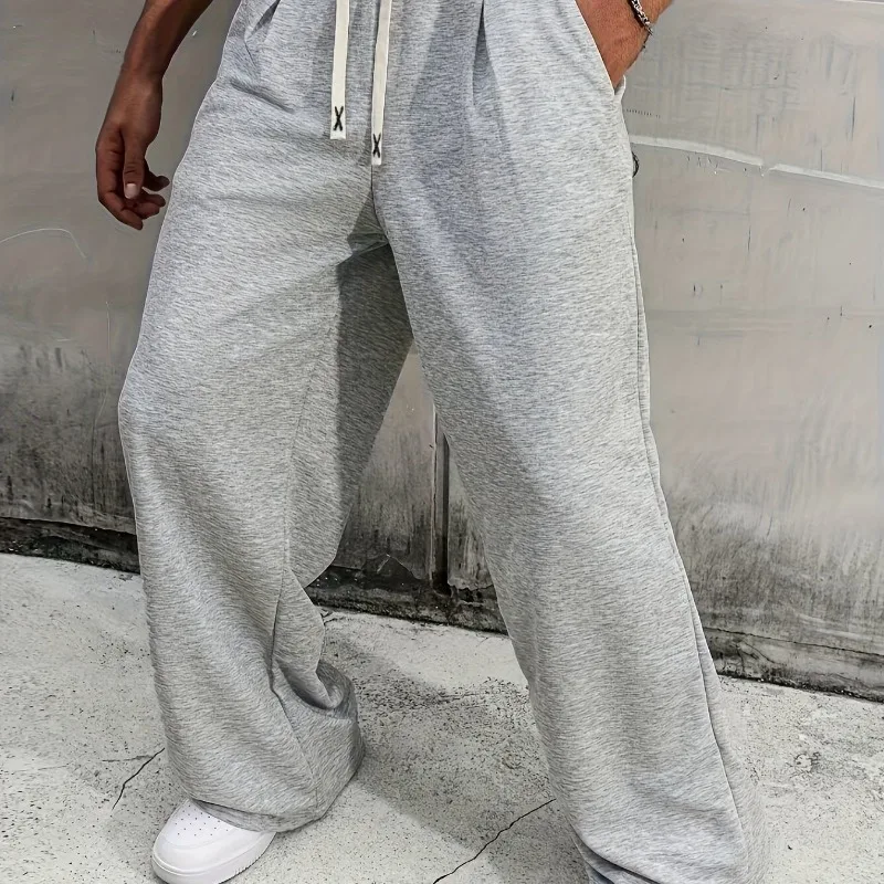 Американские уличные мужские повседневные широкие спортивные брюки, осенне-зимние новые однотонные повседневные модные спортивные брюки
Американские уличные мужские повседневные широкие спортивные брюки, осенне-зимние новые однотонные повседневные модные спортивные брюки
