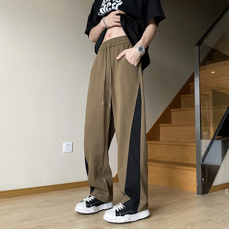 2023 Men Loose Casual Pants Solid Color Wide Leg Pants Streetwear Fashion Sports Jogger New Summer Full Length Trousers A81
2023 Men Loose Casual Pants Solid Color Wide Leg Pants Streetwear Fashion Sports Jogger New Summer Full Length Trousers A81