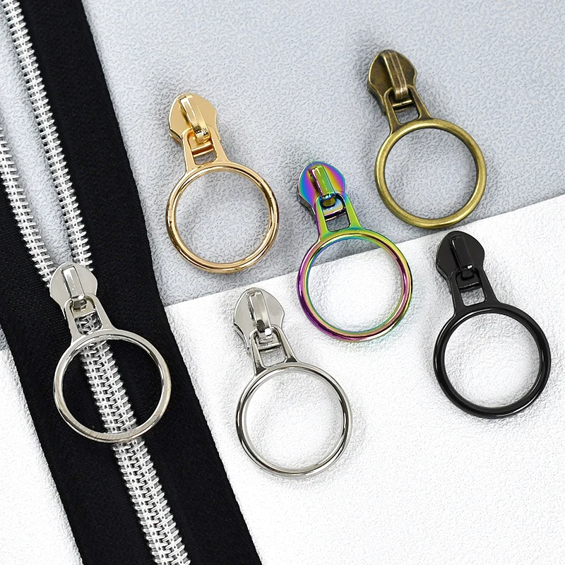 5/10/20Pcs 5# Nylon Zipper Puller O-ring Zip Head Backpack Replacement Zippers Clothes Decor Zips Repair Kit Sewing Accessories 
5/10/20Pcs 5# Nylon Zipper Puller O-ring Zip Head Backpack Replacement Zippers Clothes Decor Zips Repair Kit Sewing Accessories