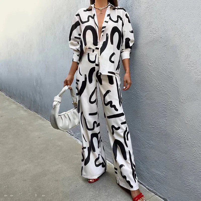 2023 Women Suit Autumn New Print Long Sleeve Turn-down Collar Button Top And High Waist Wide Leg Pant Two Piece Sets Casual Suit
2023 Women Suit Autumn New Print Long Sleeve Turn-down Collar Button Top And High Waist Wide Leg Pant Two Piece Sets Casual Suit